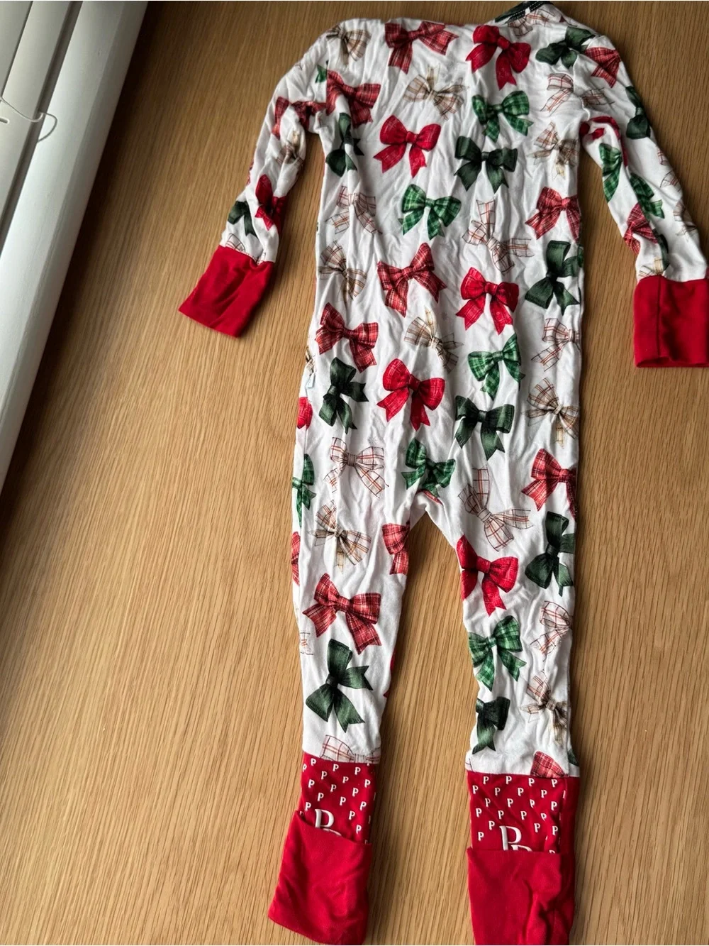Posh Peanut Christabel Convertible One-Piece Pajamas with Red and Green Bows